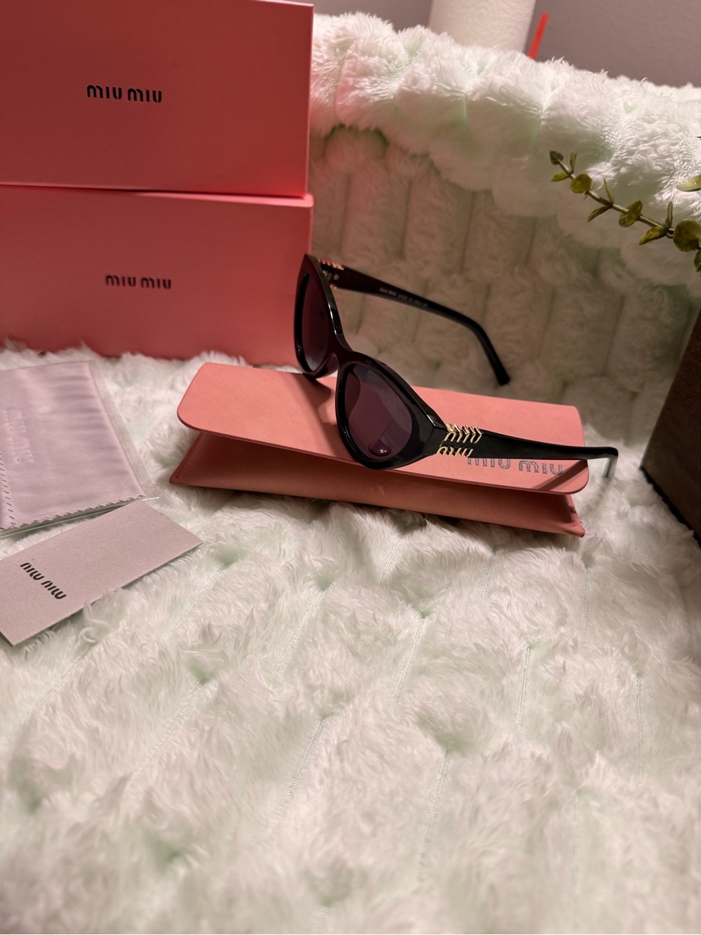 Miu Miu Black Cat-Eye Sunglasses with Gold Accent Detail